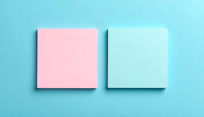 Two blank sticky notes on blue background, minimalist mock-up for design or messages.