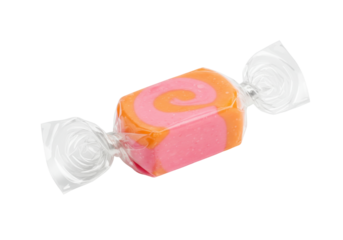 Isolated candy wrapped in cellophane with pink and orange swirl design, confectionary