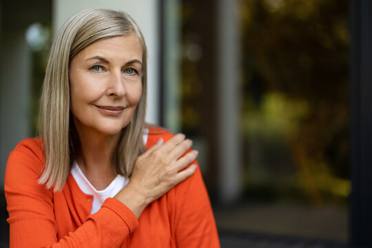 Pretty senior caucasian woman feeling relaxed and peaceful