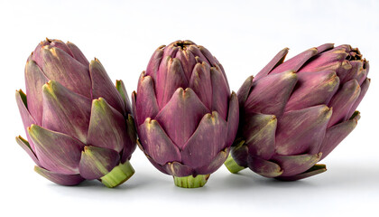 Obraz premium Three Fresh Purple Artichokes on White Background 
