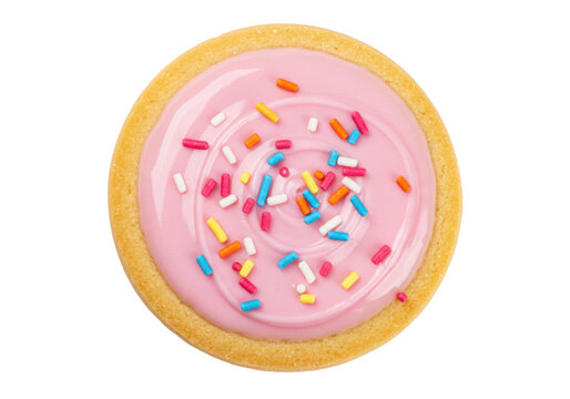 Isolated sugar cookie with pink frosting and sprinkles for party or birthday treat