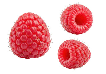 Three bright red raspberries isolated on a stark black background isolated on transparent background