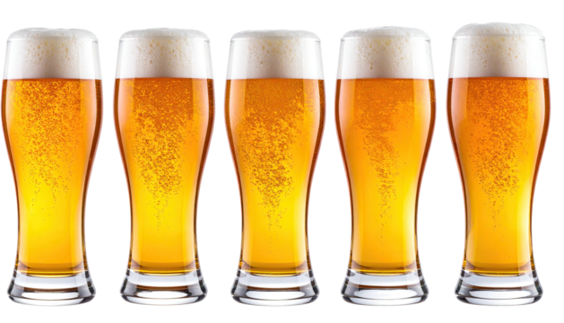 Five glasses of golden beer with foamy heads, close together