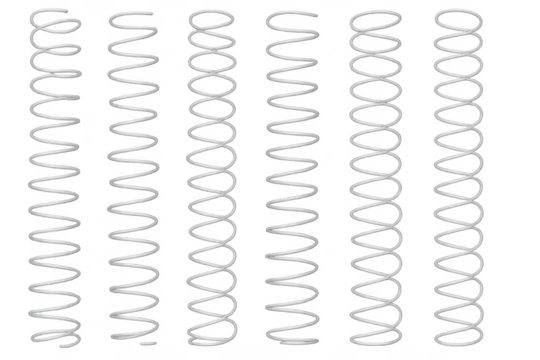 Set of metal compression springs on transparent background