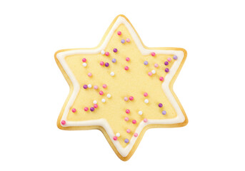 Isolated star-shaped cookie with icing border and colorful sprinkles on top for a holiday treat