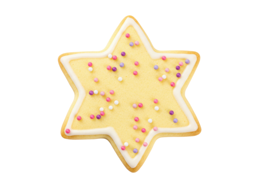 Isolated star-shaped cookie with icing border and colorful sprinkles on top for a holiday treat