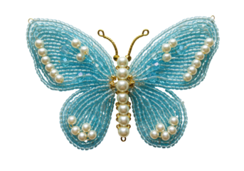 Isolated beaded butterfly brooch with pearl accents, embellishment and jewelry craftwork design