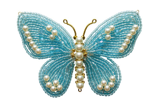 Isolated beaded butterfly brooch with pearl accents, embellishment and jewelry craftwork design