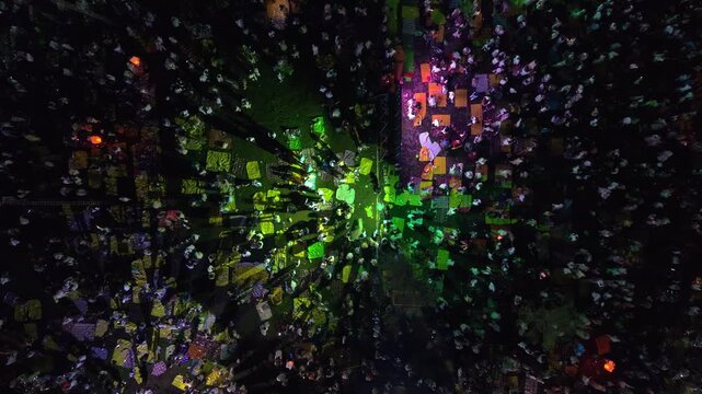 Aerial view of the Parangtritis Lantern Festival aglow with vibrant lights amidst the crowd, creating a mesmerizing spectacle, Yogyakarta, Special Region of Yogyakarta, Indonesia.