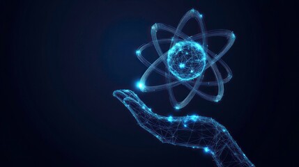 A hand holding an atom