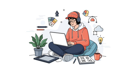 A person wearing headphones is working on a laptop while sitting cross-legged on a beanbag.