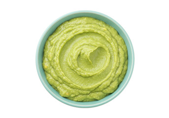 Isolated green guacamole swirl in bowl, fresh avocado dip served as appetizer, healthy eating