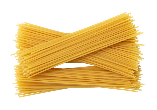 Isolated heap of dry uncooked spaghetti ready to be cooked for making pasta dishes