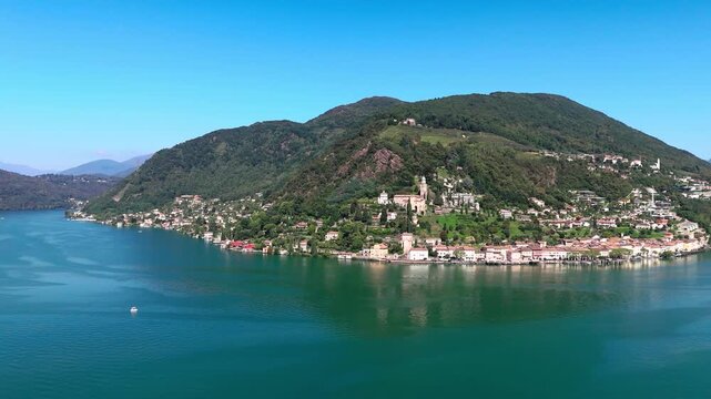 View of Morcote in Switzerland. Church, houses, Lake Lugano and more