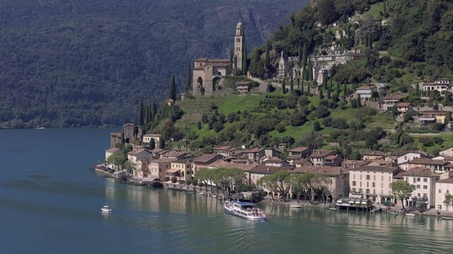 Ferry arrives at Morcote, Switzerland
