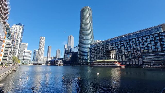 Residential skyscrapers  in Millwall dock at sunny day. London, UK
