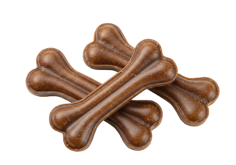 Isolated heap of brown dog bones treats for puppies chewing and teeth cleaning, fun food