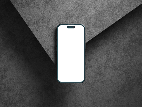 Blank phone screen on gray cement texture with shadows and depth.