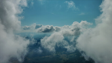 Clouds and mountains, flying in clouds