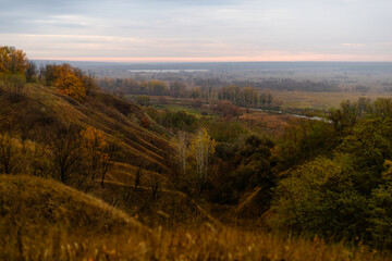 Autumn hills covered with colorful trees