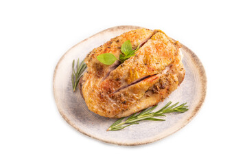 Fried Turkey Thigh with spices on plate isolated on white. side view, close up