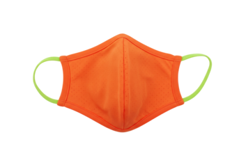 Isolated orange face mask with green trim, protective gear, safety during pandemic era