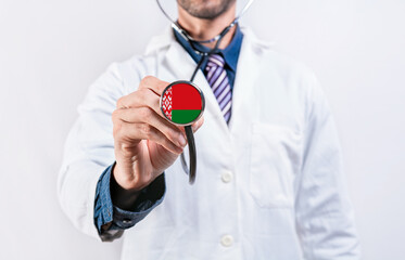 Belarus healthcare system, doctor holding stethoscope. Belarus health and medical insurance concept
