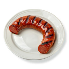 Grilled kielbasa isolated on white background, displaying its curved shape and appetizing grill marks, a flavorful addition to any meal or barbecue