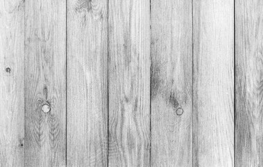 Close-up of a white wall emphasizing the natural grain and texture of wood