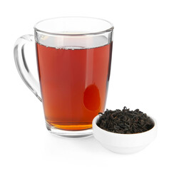 Cup of delicious tea and brew isolated on white