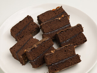 Chocolate cake or chocolate steamed brownie on white background