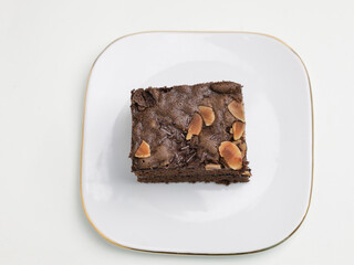 Chocolate cake or chocolate steamed brownie on white background