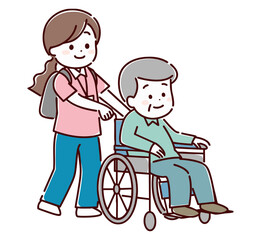 シニア男性を車椅子で送る女性