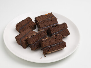 Chocolate cake or chocolate steamed brownie on white background