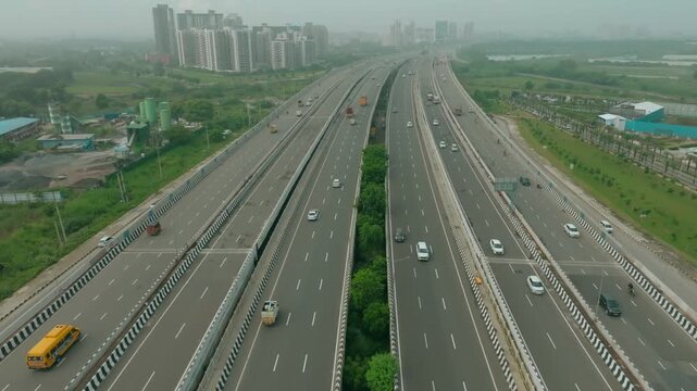 Aerial view of the Dwarka Expressway shows the vibrant highway cutting through Gurugram, Haryana, India.