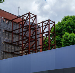 London - 06 28 2022: Scaffolding supporting a building on Old Brompton Road