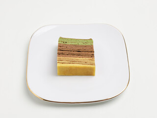 Lapis Legit or thousand layer cake on white background