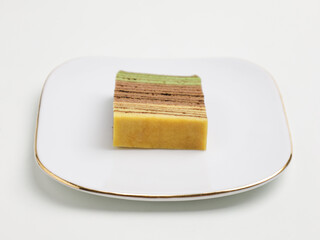 Lapis Legit or thousand layer cake on white background