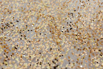 Golden Glitter Bokeh Texture on White Fabric