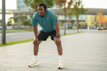 Fototapeta premium African american man resting after intense urban workout