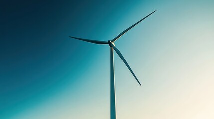 Fototapeta premium Rotating wind turbine under clear blue sky during daytime