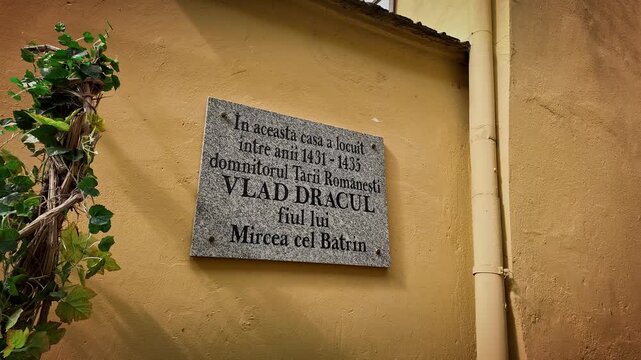 Wall plaque on Vlad Dracula&rsquo;s birthplace Romanian tourist attraction