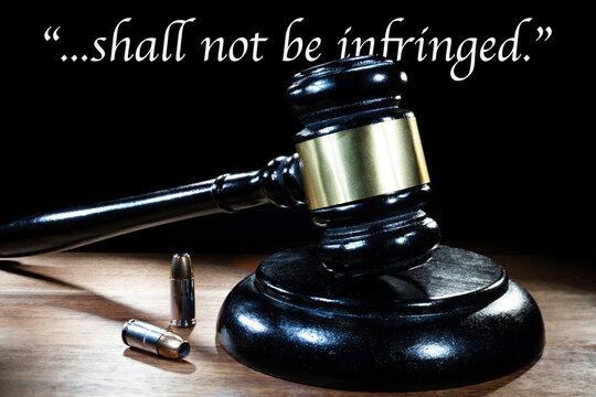 Court gavel with ammo and second amendment words