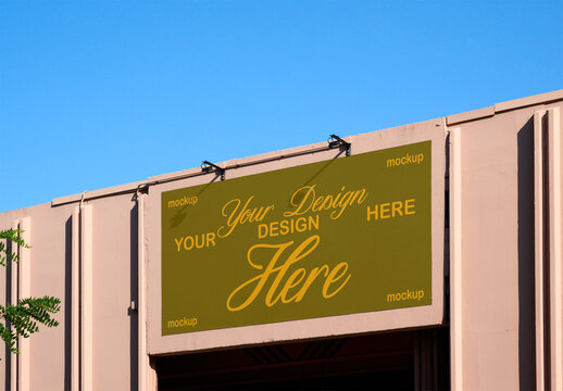 Wharehouse storefront against a clear blue sky.