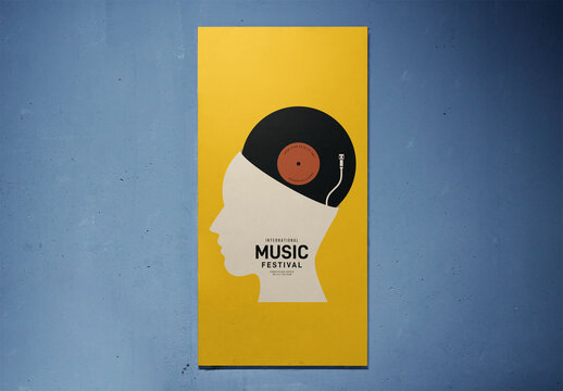 Vertical poster on a indoors textured blue wall