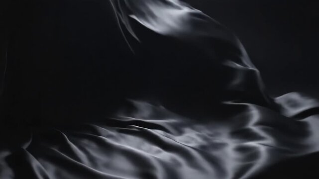 Abstract Dark Fabric Flowing Motion Background with Light Reflections.