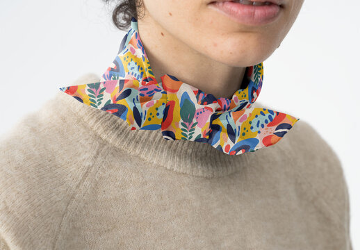 Mockup Of Woman Wearing Customizable Scarf Around Neck