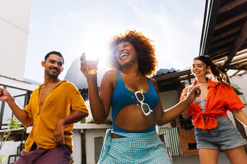 Three friends enjoying a sunny weekend outdoors in Rio de Janeiro