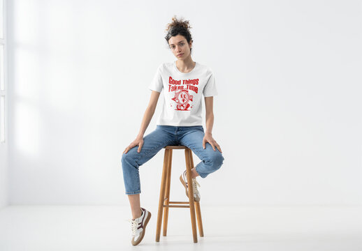 Mockup Of Woman Wearing Customized T-Shirt On Stool