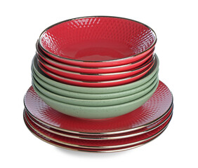Stack of different ceramic dishware isolated on white